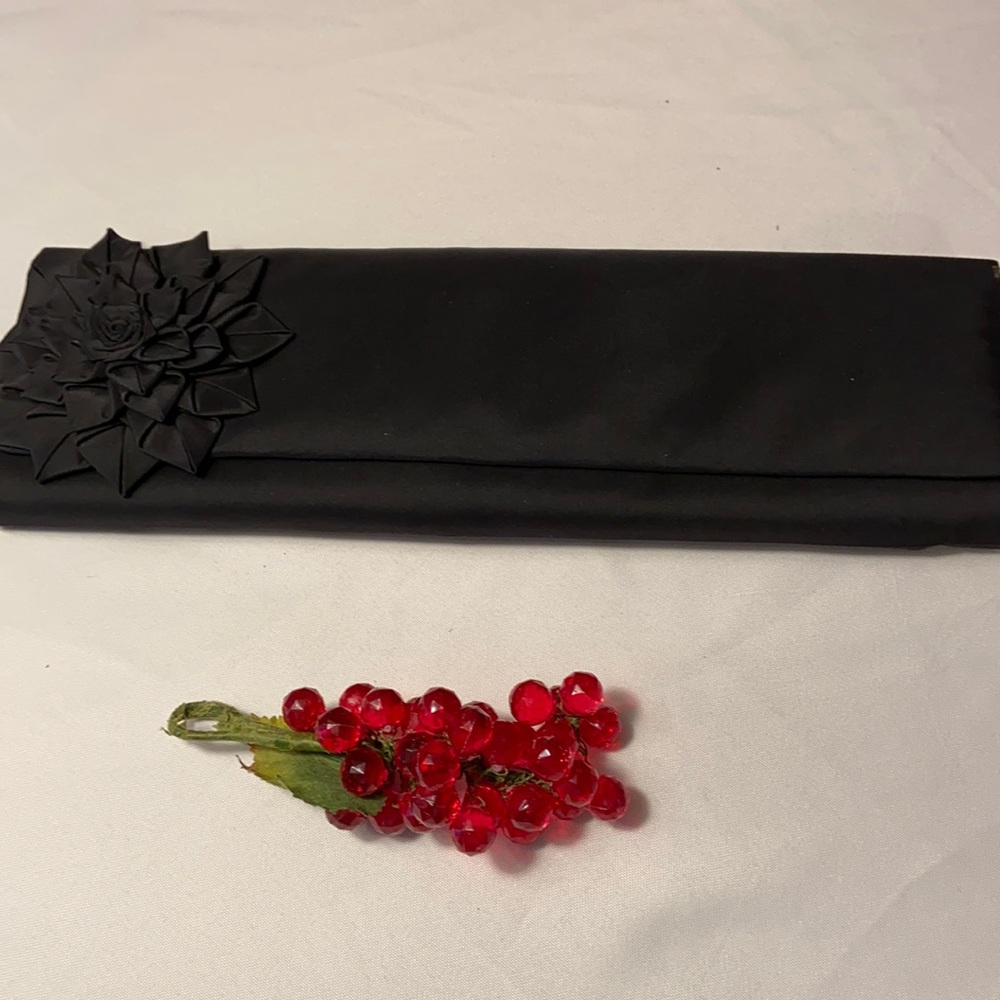Inge Christopher black clutch